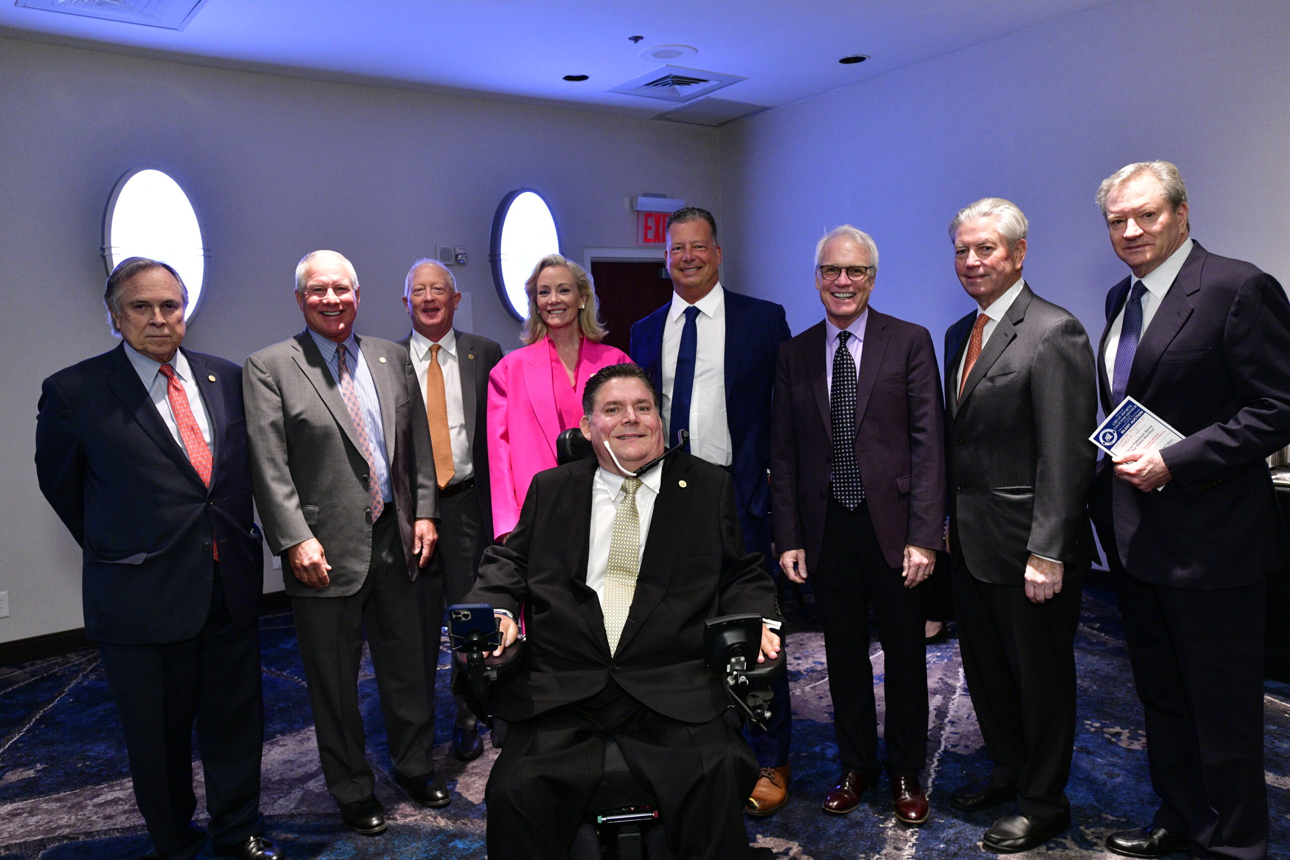 Marc Buoniconti flanked by members of The Buoniconti Fund Board of Directors