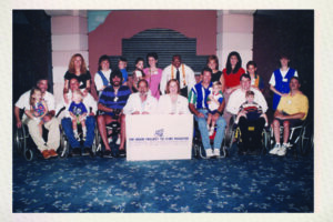 Drs. Charles Lynne and Nancy Brackett hosting a 1995 reunion of families helped by the Miami Project’s Fertility Program